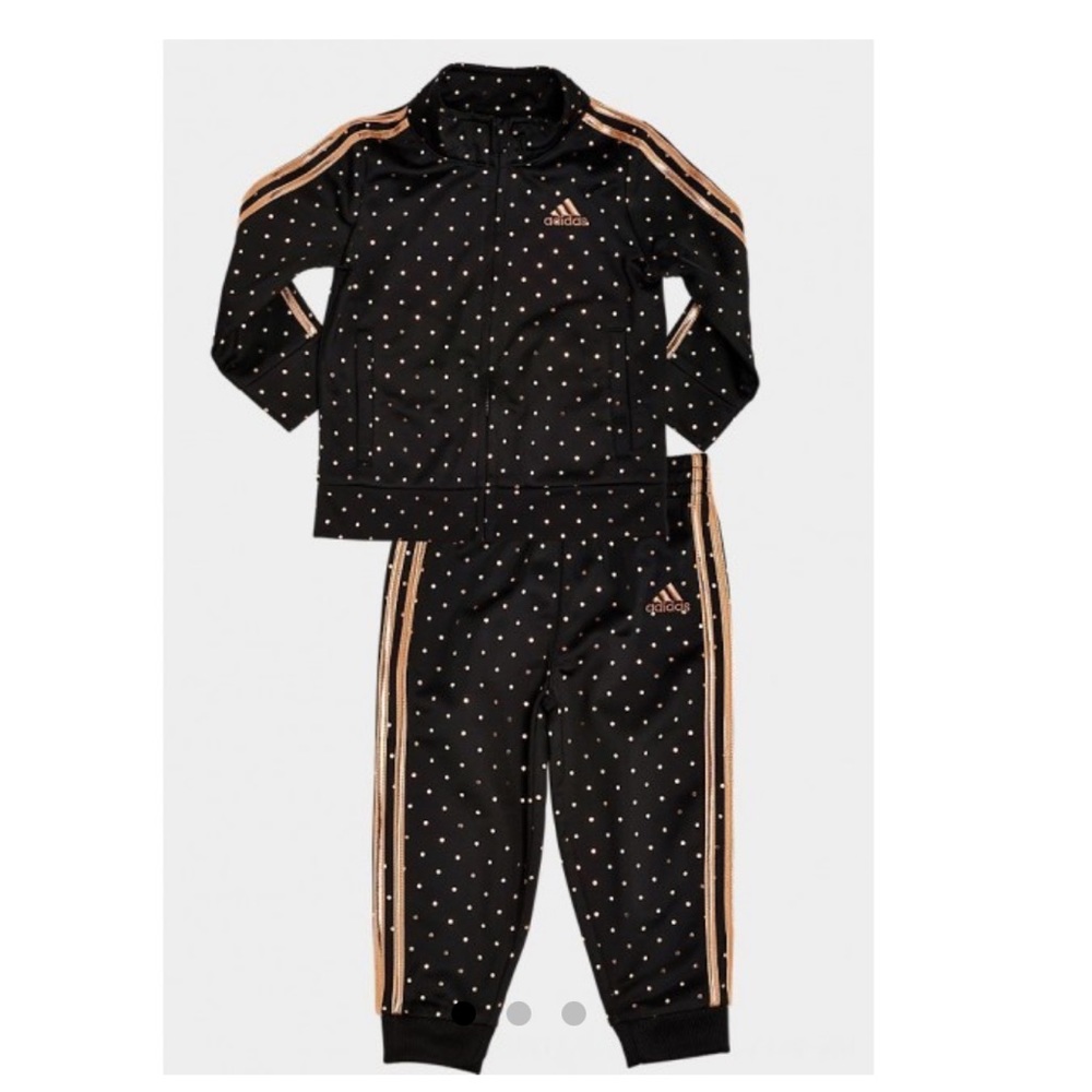 Adidas track suit. Brand new !!